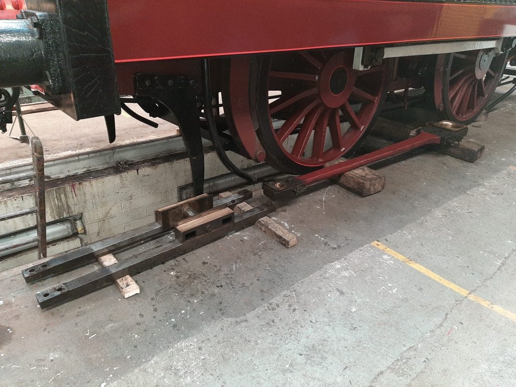 The left hand slide bars and connecting rod dismantled in the FRT shed for measuring