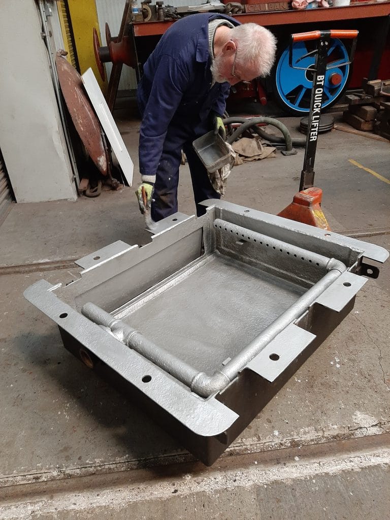 Sim puts the finishing touches to FR 20's ashpan